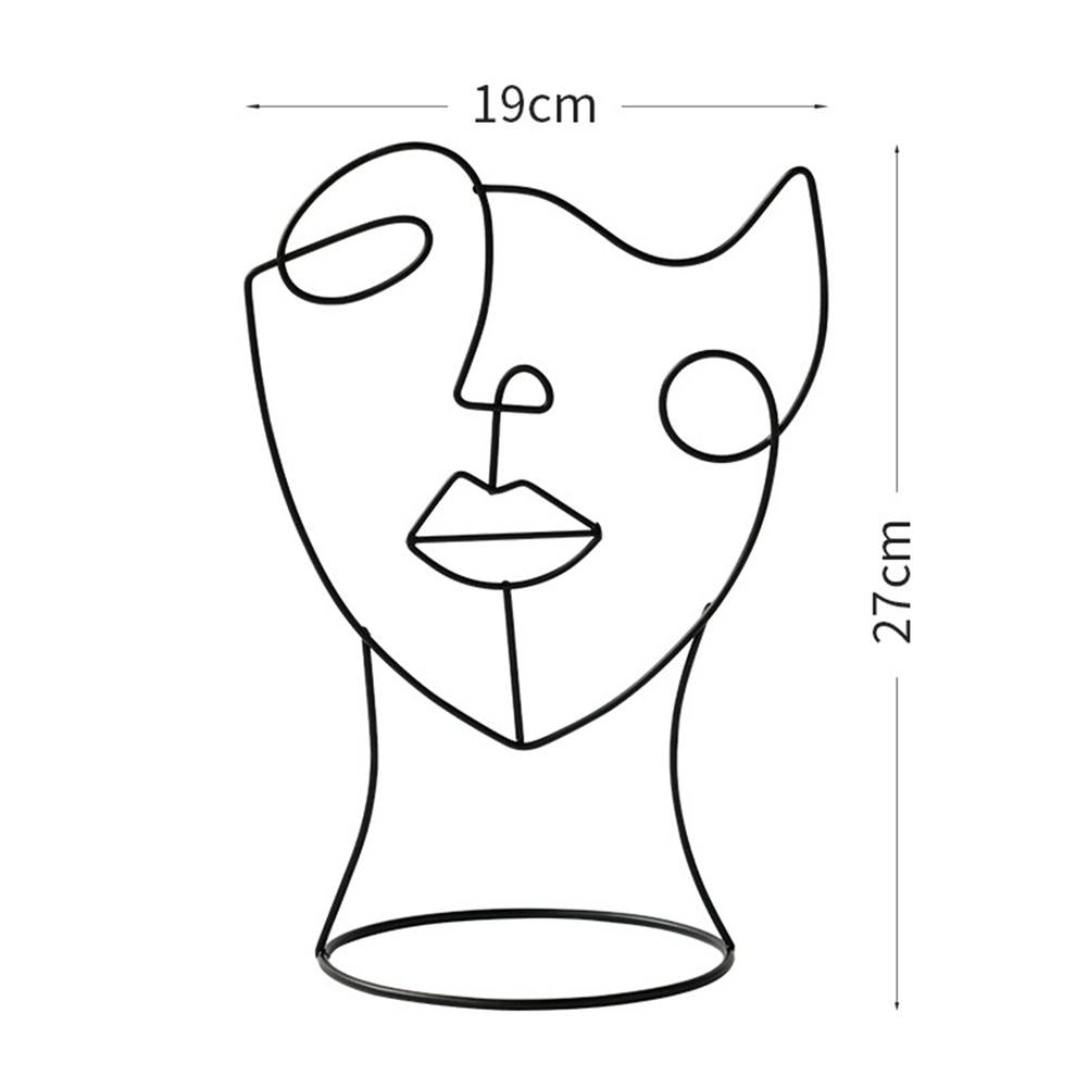 Abstract Metal Face Figure Ornament